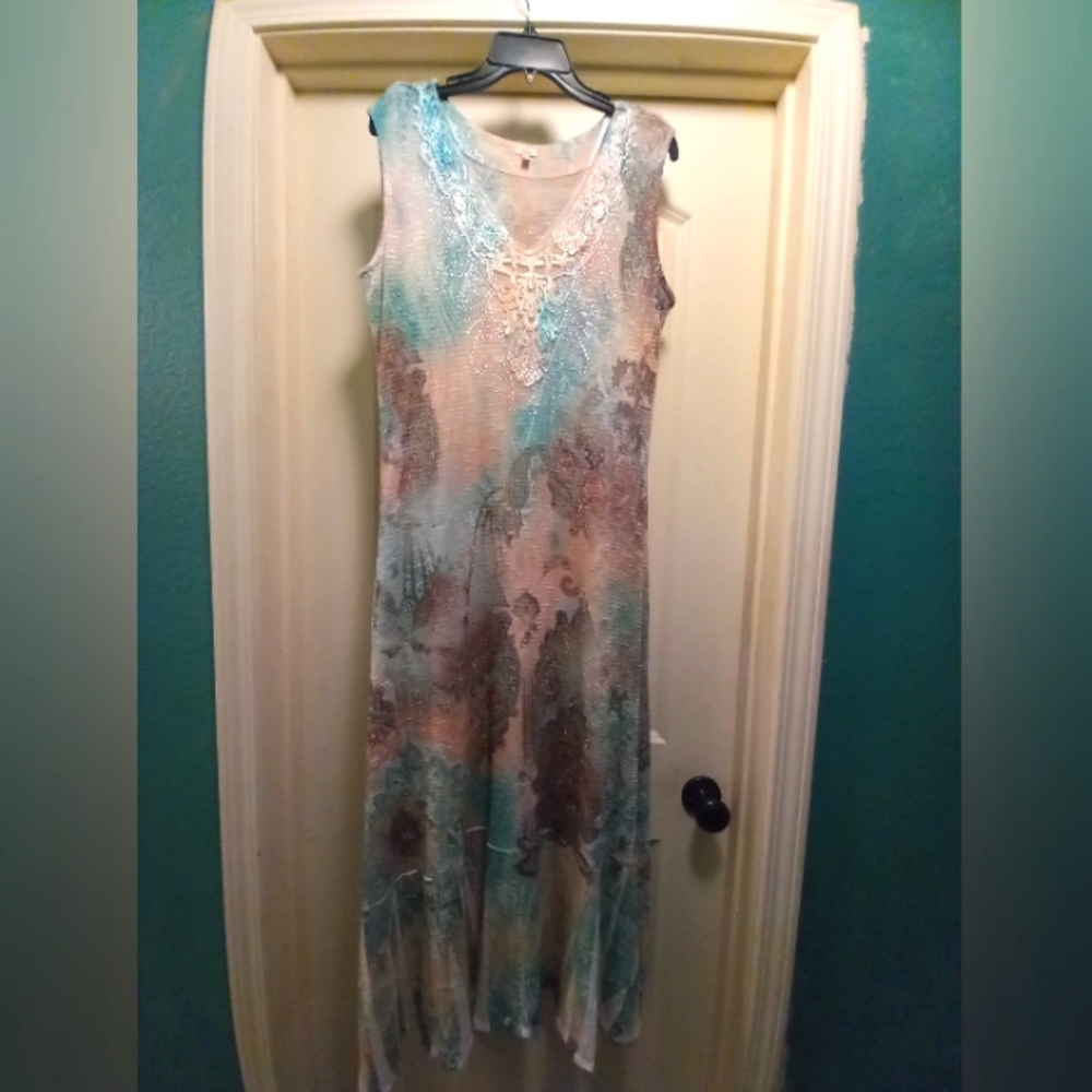 REBA DRESS WORN NEVER WORN XL SLEEVELESS FLOWING.